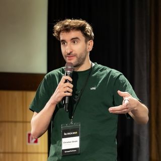 Christian Strehl, speaking on stage